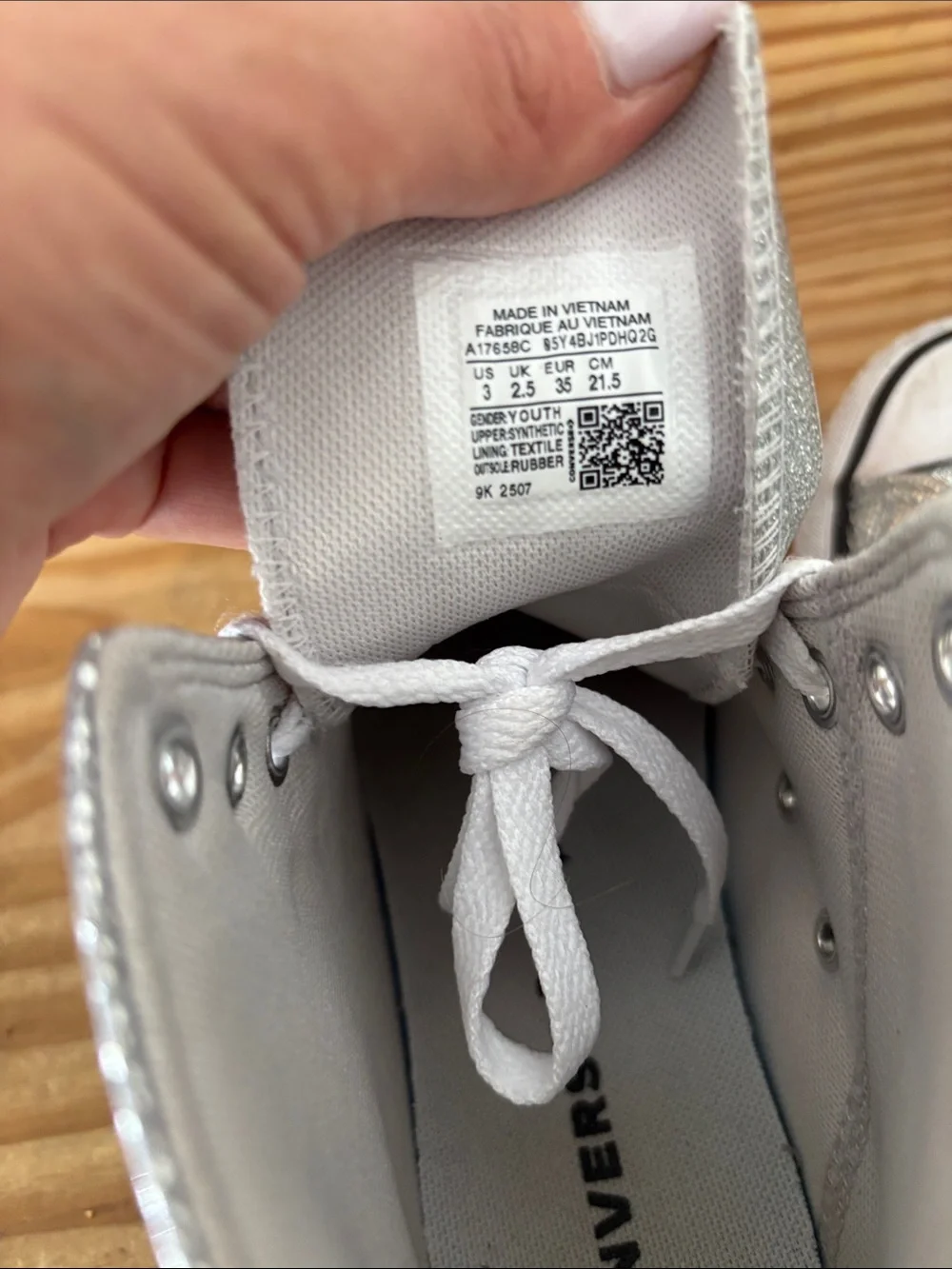 Silver sparkly high top converse